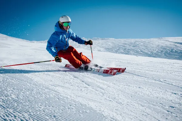 Man skiing down a slope